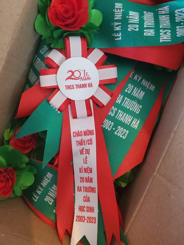 Mẫu hoa cài áo đại biểu