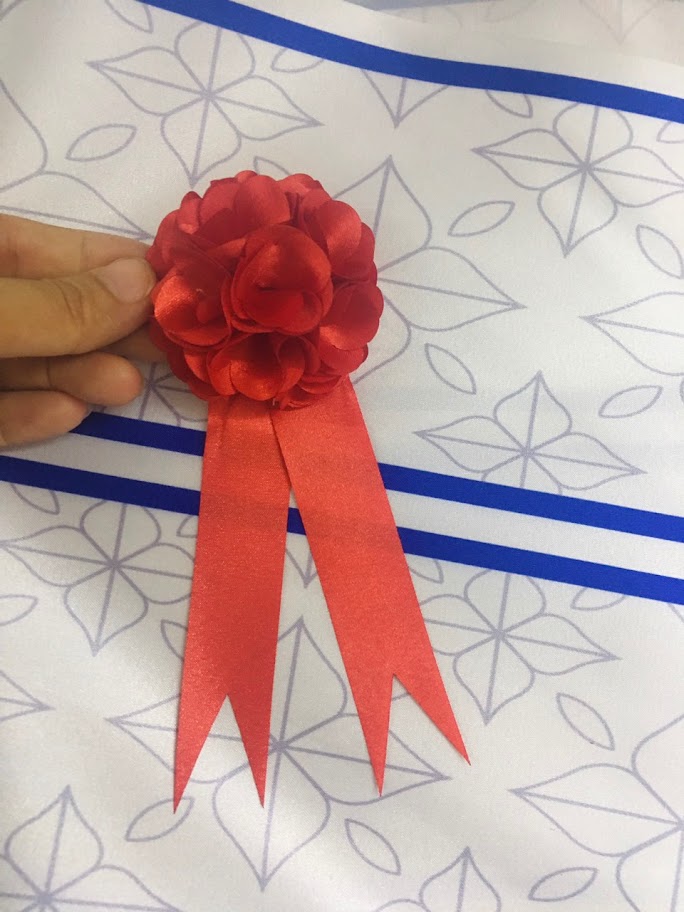 Cửa hàng bán hoa cài áo đại biểu