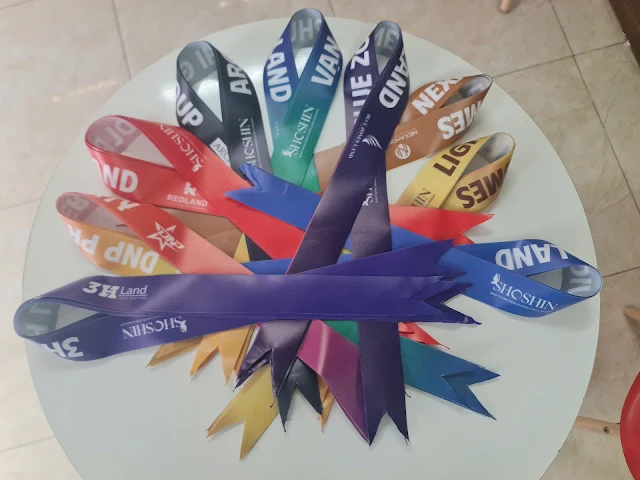 Băng rôn đeo đầu in logo công ty